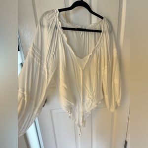 White long sleeve top